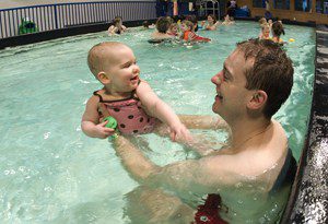 Dad and kid dad and kid swimming
